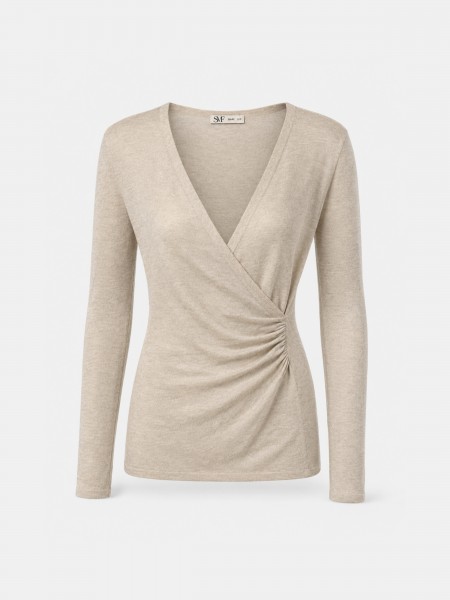 Knitted sweater with draping